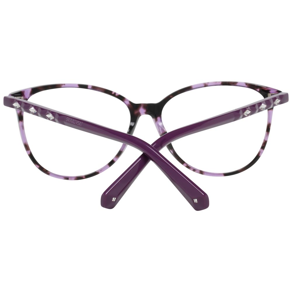 Swarovski Multicolor Plastic Glasses (Frames): Purple cat-eye women’s eyeglasses with a translucent purple and pink full-rim frame, decorative studs near the hinges, arms crossed, viewed from the back.