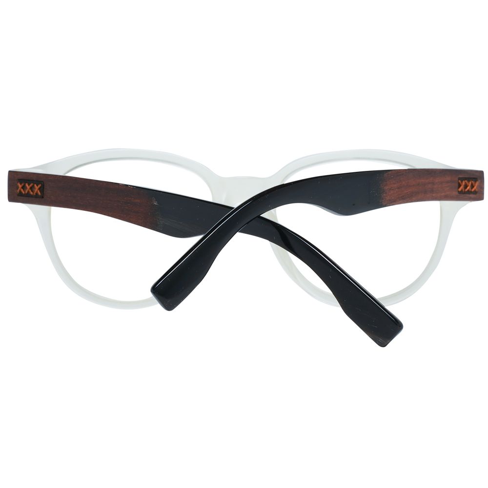 Ermenegildo Zegna Transparent Plastic Glasses feature round clear frames, dark wood-textured temples with three gold Xs on each side, and crossed arms displayed in front of the lenses.